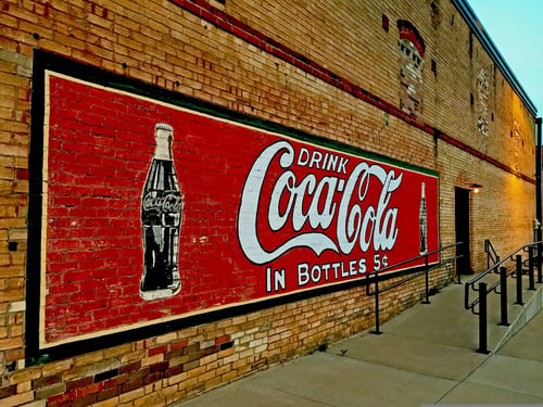The Red Wall on the Boom Street: Kilgore's Historic Coca-Cola Mural 🎨
