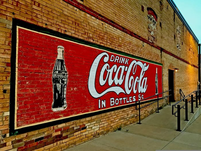 The Red Wall on the Boom Street: Kilgore's Historic Coca-Cola Mural 🎨